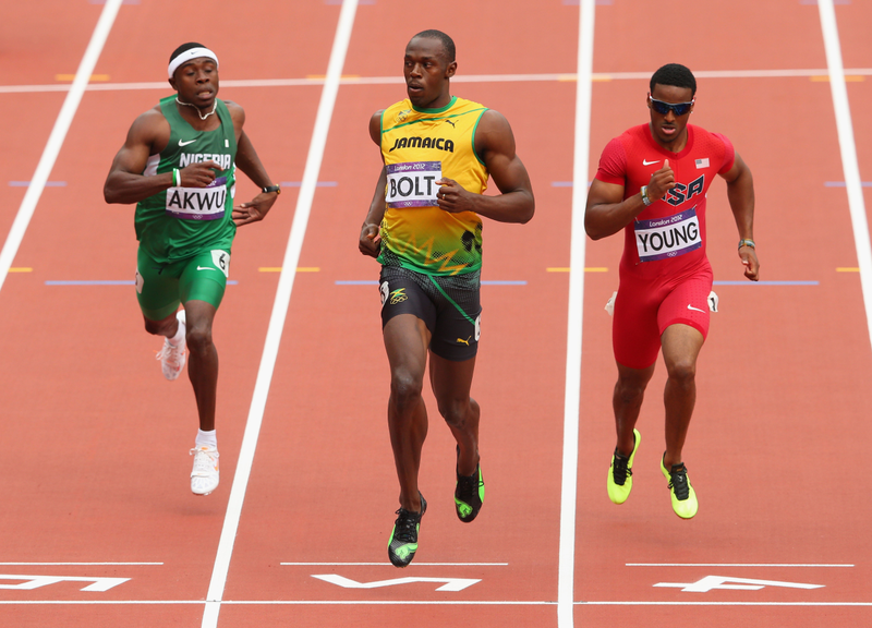 Illustration for article titled Photos Of Usain Bolt Looking Bored As He Blows Past The Best Runners In The World